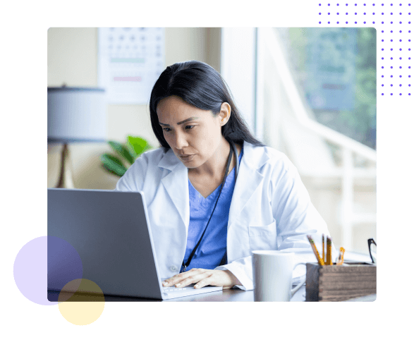 Physician looking at a computer - HealthStream